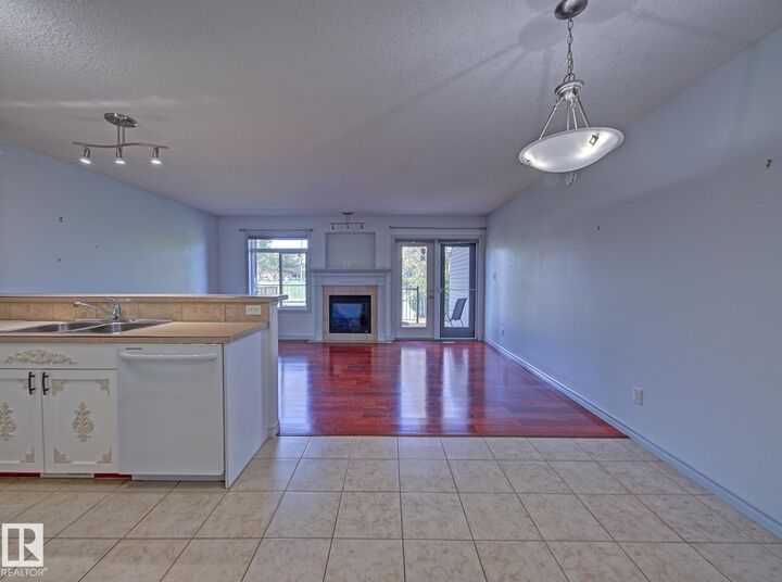 Property Photo: 10 Woodcrest Lane 3 AB T8L 4R8