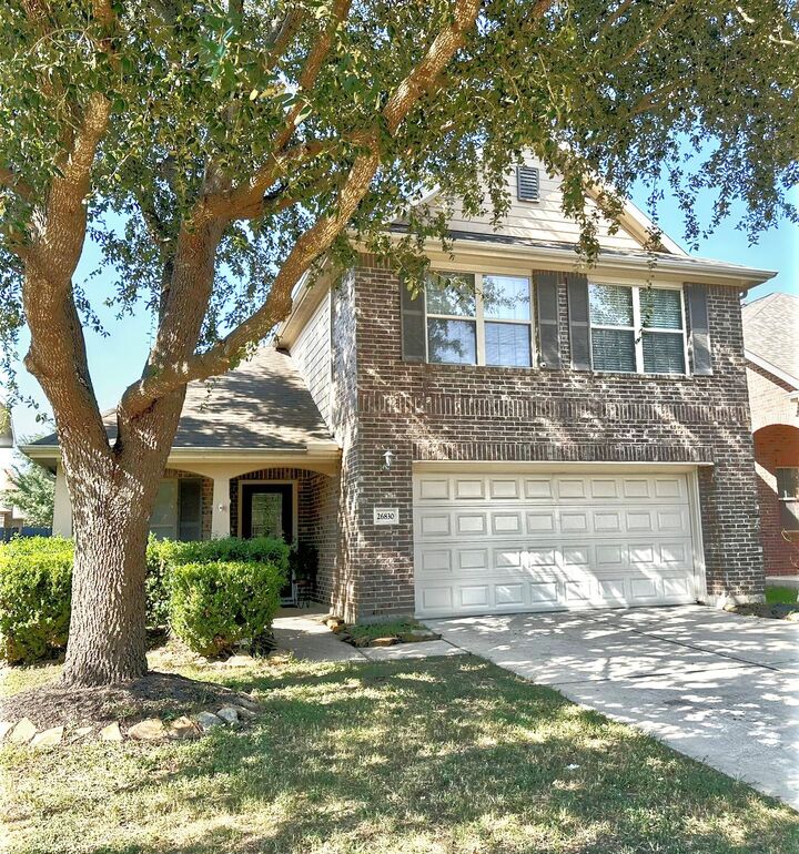 Property Photo: 26830 Henson Falls Drive TX 77494