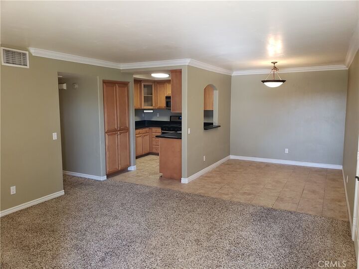 Property Photo:  5054 Los Morros Way 102  CA 92057 