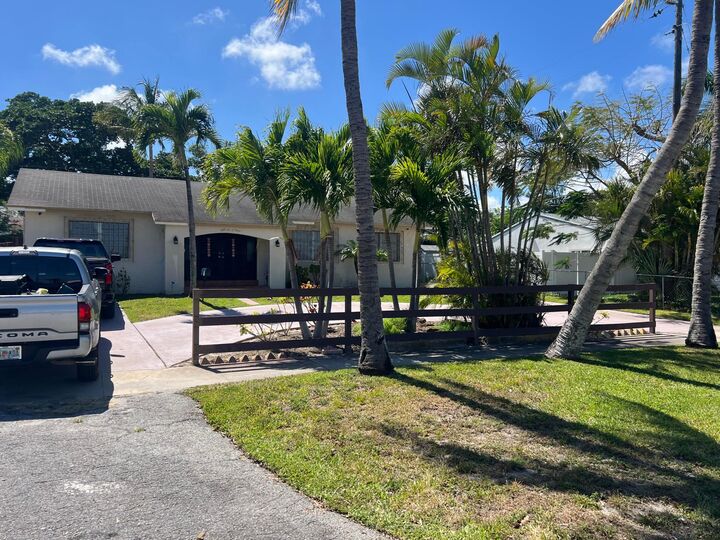 Property Photo:  5603 Parker Avenue  FL 33405 