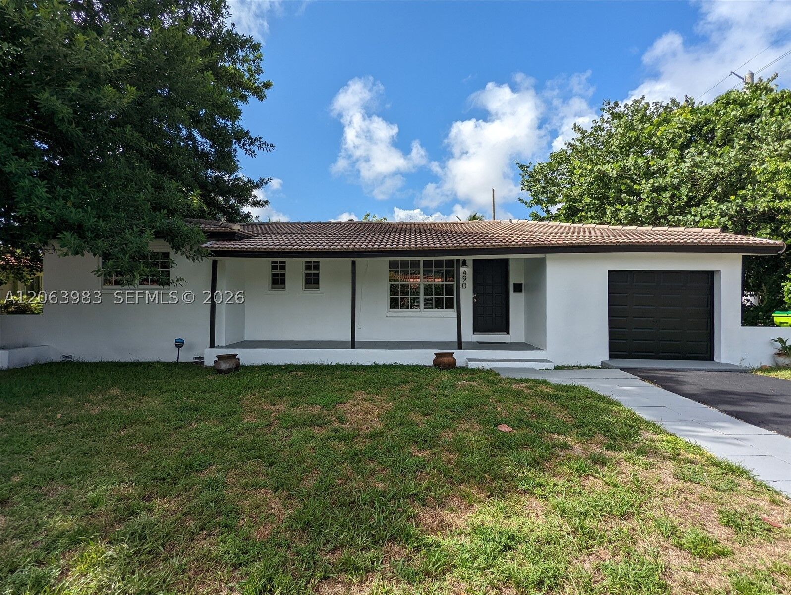 Property Photo: 490 NW 90th St . FL 33150