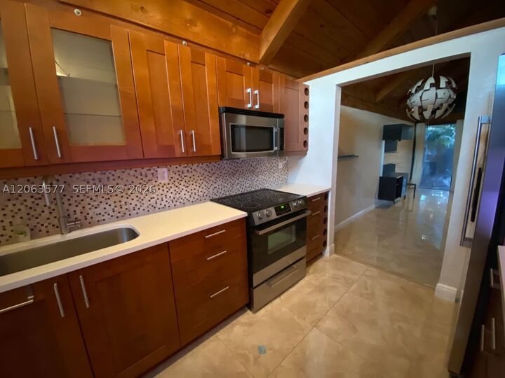 Property Photo:  485 N University Dr 3-6  FL 33324 
