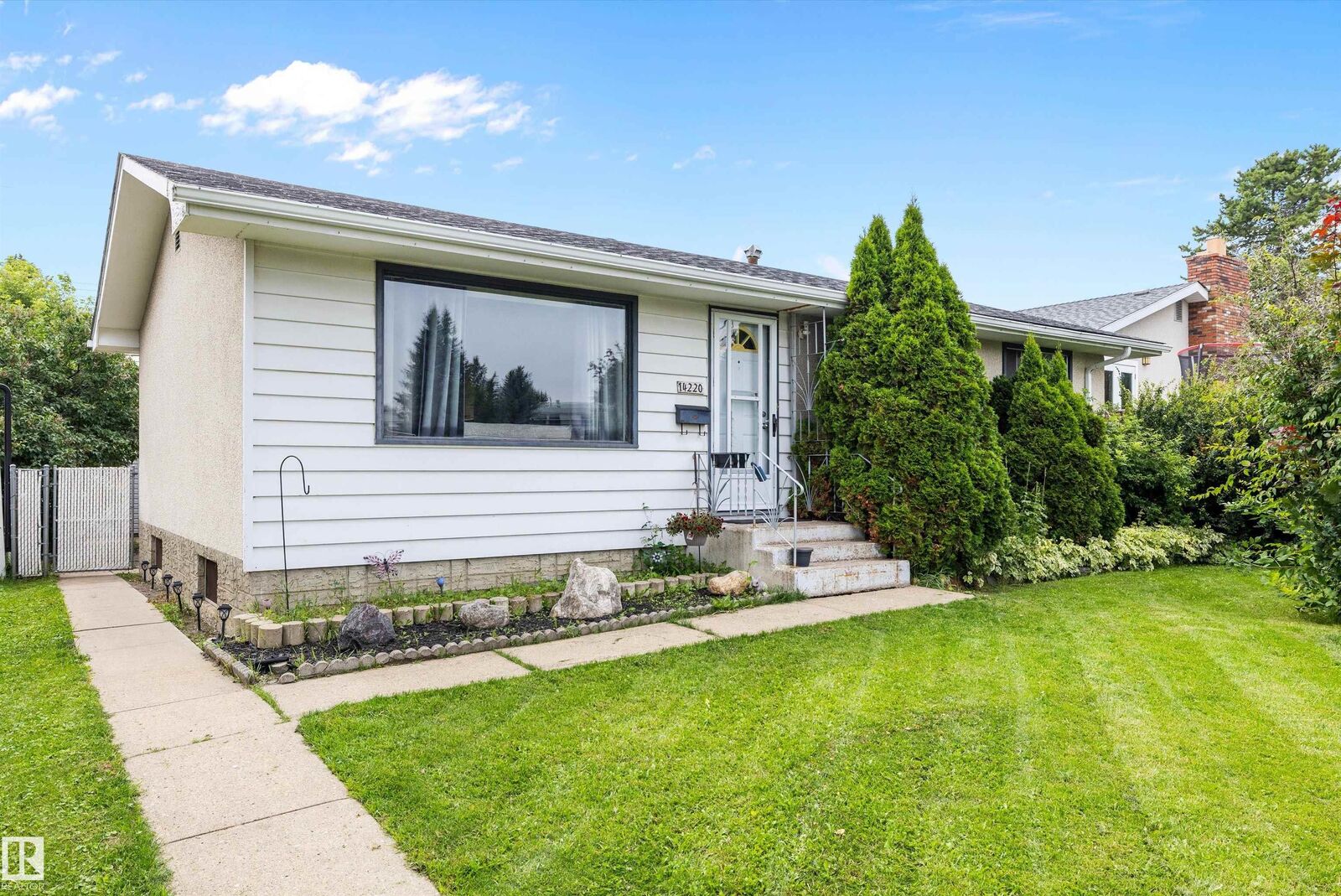 Property Photo:  14220 58 Street NW  AB T5A 1N4 