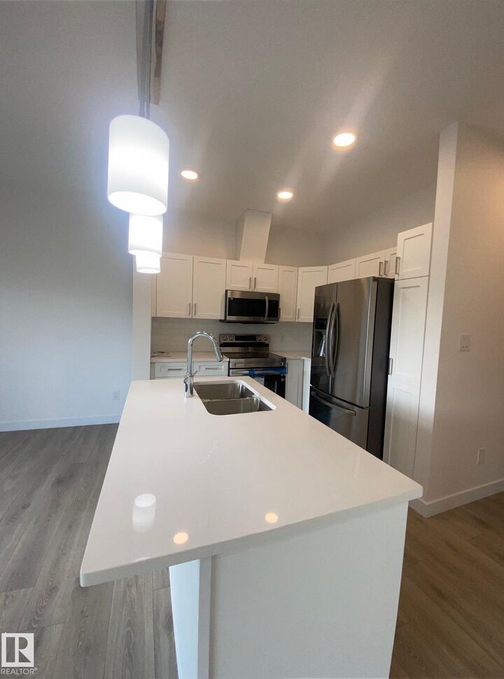 Property Photo:  603 Orchards Boulevard SW 21  AB T6X 2W8 