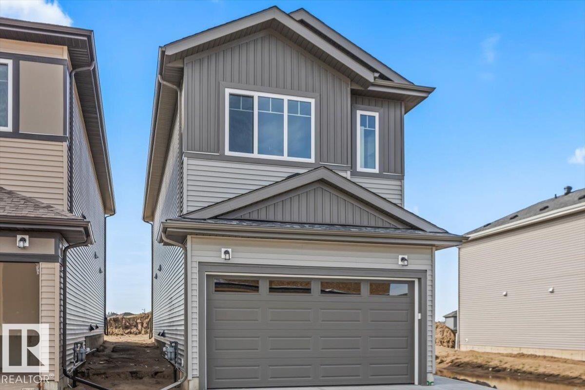 Property Photo: 25 Foxtail Road AB T8L 0Z5