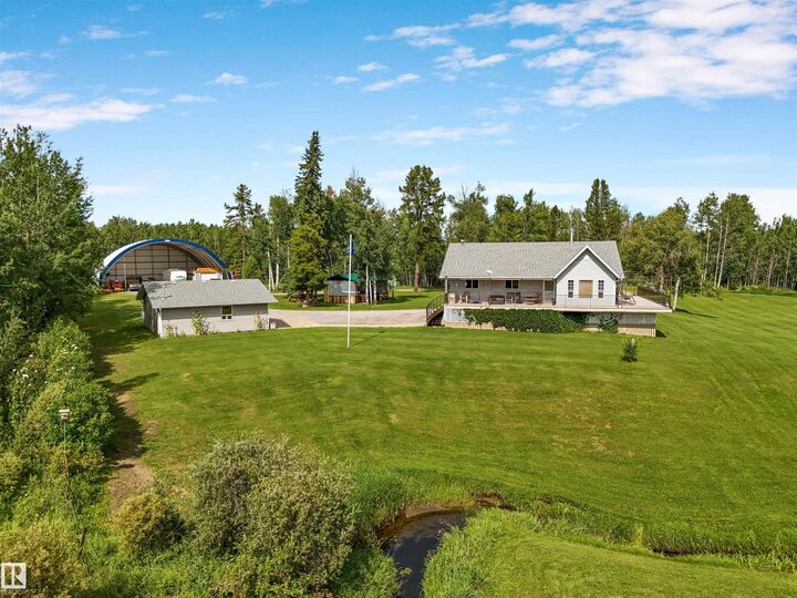 Property Photo: 50128 Hwy 22 AB T7A 2A2