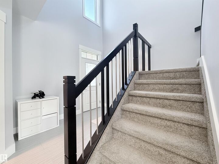 Property Photo:  8719 218 Street NW  AB T5T 4R7 