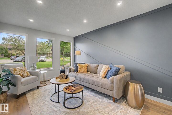 Property Photo:  133 Grandin Village  AB T8N 1R9 