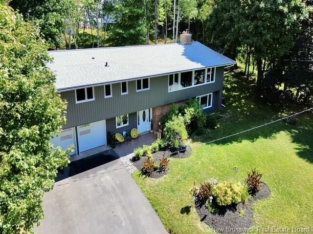 Property Photo: 829 Edgehill Row NB E2M 4G6
