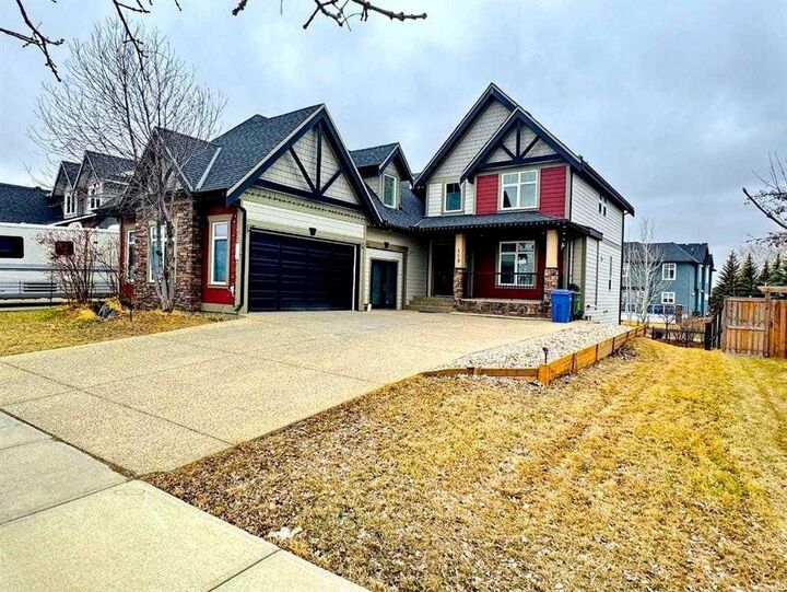 Property Photo: 109 Kinniburgh Boulevard E Boulevard E AB T1X 0L9