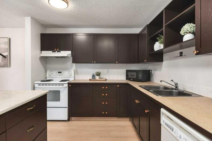 Property Photo: 550 Westwood Drive SW 305 AB T3C 3T9