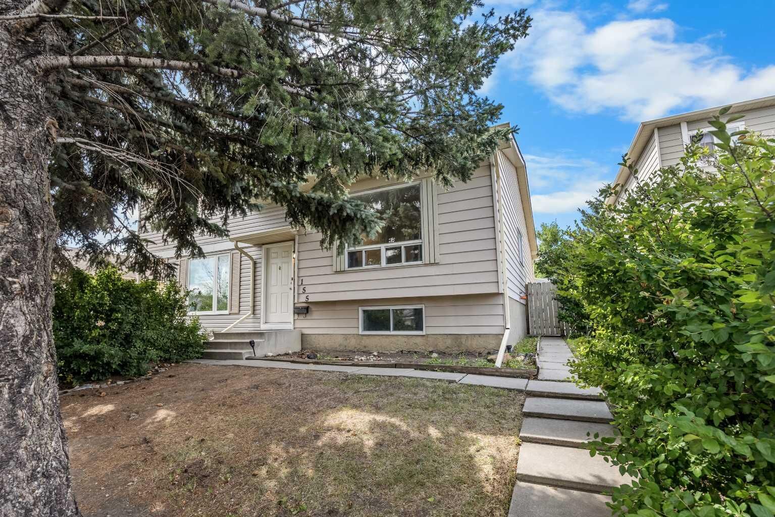 Property Photo: 155 Sandarac Way NW AB T3K 2Y4