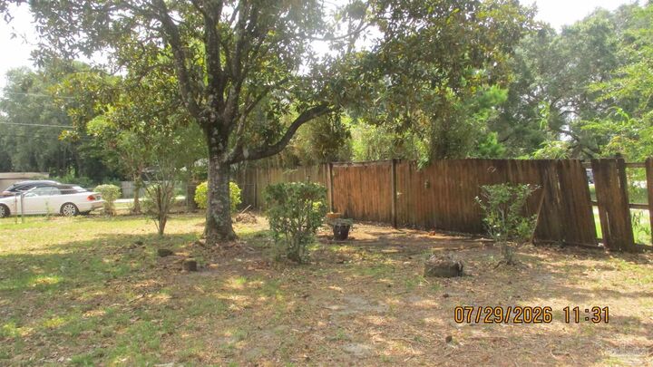 Property Photo:  9741 Fowler Ave  FL 32534 