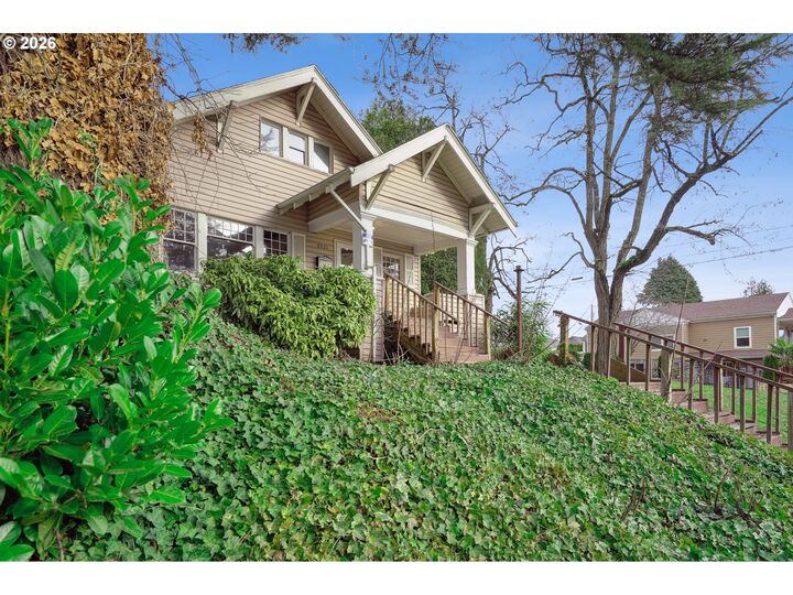 Property Photo:  8921 SE Washington St  OR 97216 