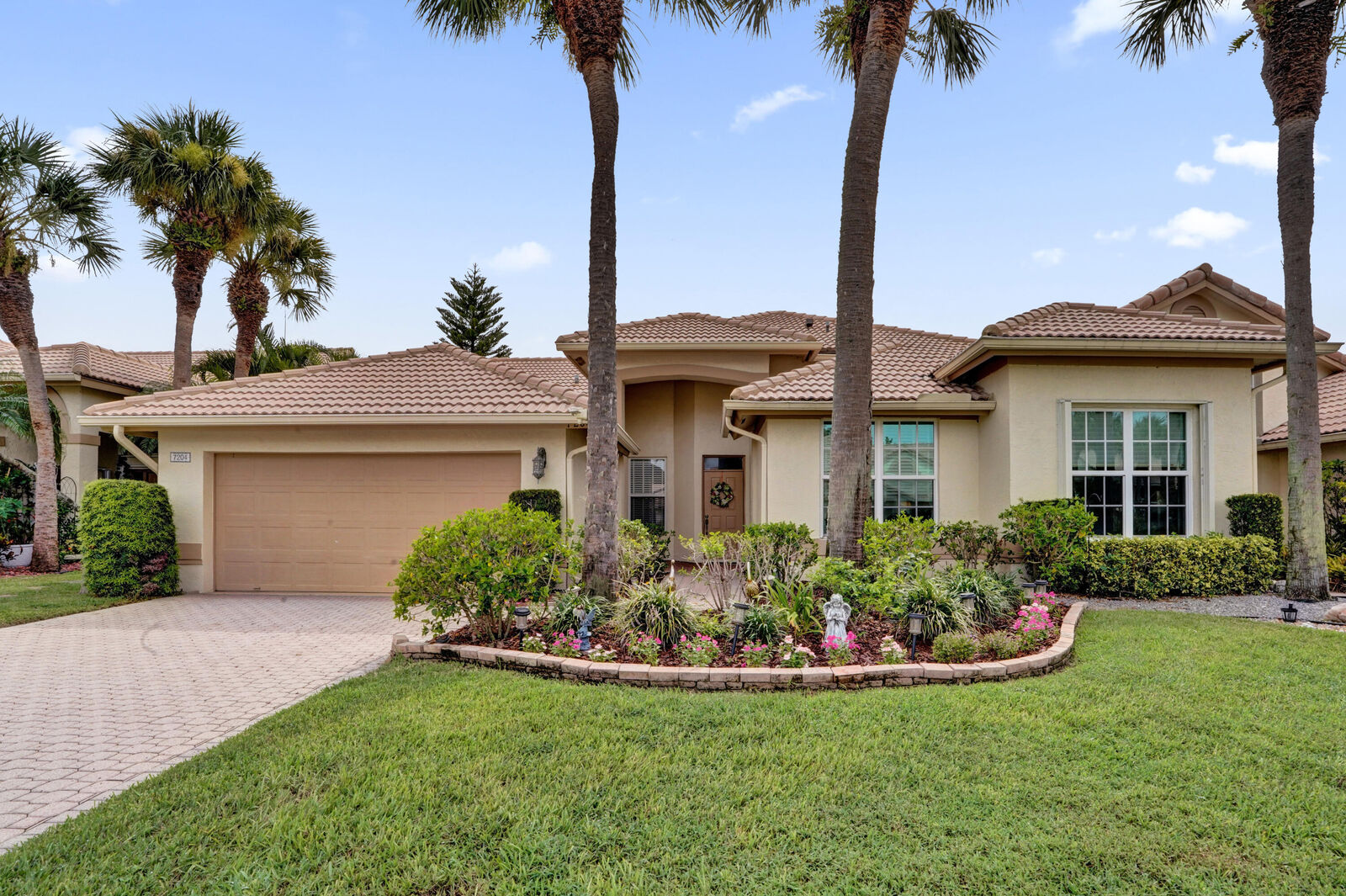 Property Photo: 7204 Ashford Lane FL 33472