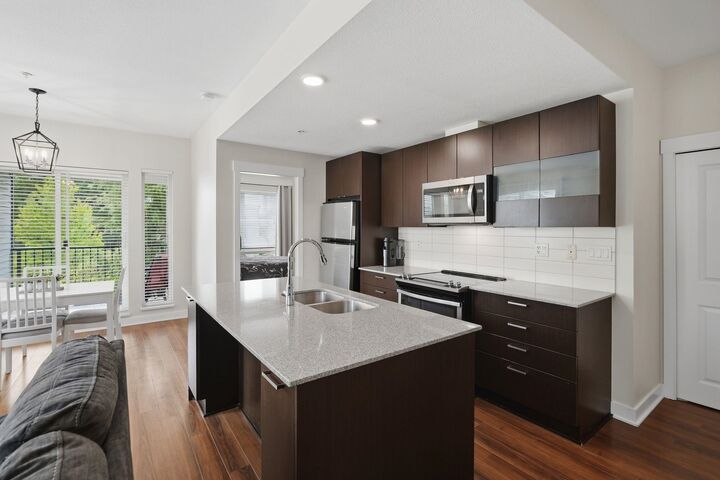 Property Photo: 13339 102A Avenue 304 BC V3T 0C5
