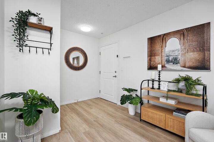 Property Photo:  11453 Ellerslie Road SW 201  AB T6W 1T3 