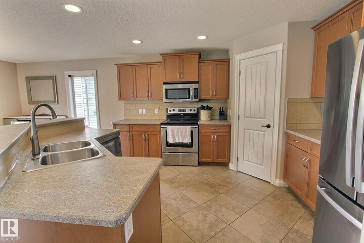 Property Photo: 10 Birchmont Crescent AB T9E 8S3