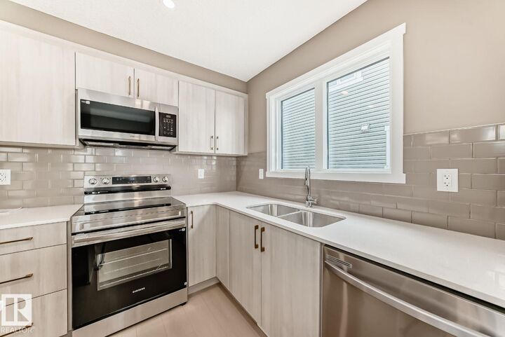 Property Photo:  1214 Stoneside Road  AB T8H 3A4 