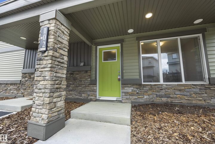 Property Photo: 1530 Tamarack Boulevard NW 102 AB T6T 2E6