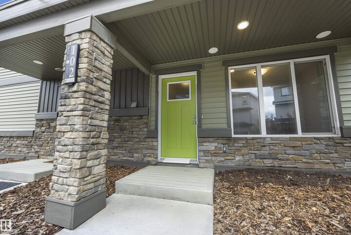 Property Photo: 1530 Tamarack Boulevard NW 102 AB T6T 2E6