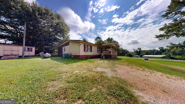 Property Photo:  93727 Highway 9  AL 36266 