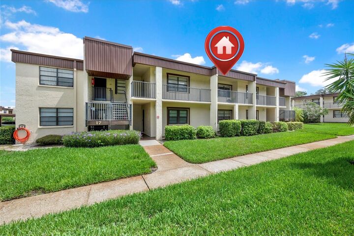 Property Photo:  2400 Winding Creek Boulevard 17-203  FL 33761 