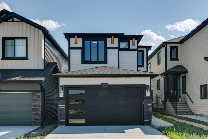 Property Photo: 162 Drystone Way NW AB T3R 2M1