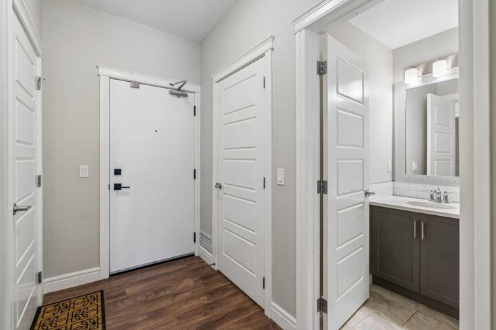 Property Photo: 19621 40 Street SE 108 AB T3M 3B2