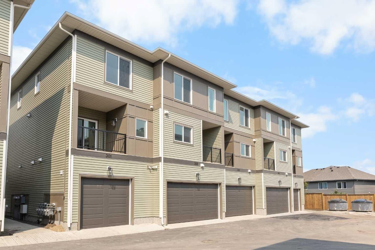 Property Photo: 67 Panatella Square NW 301 AB T3K 2S7