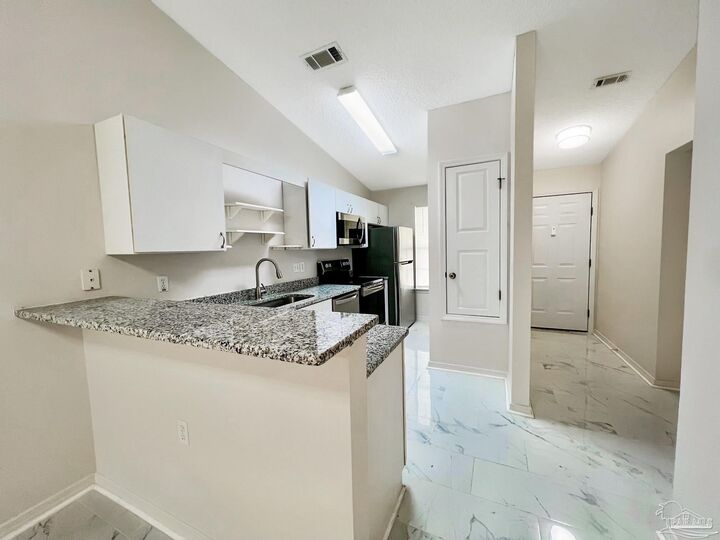 Property Photo:  8124 Heirloom Dr  FL 32514 