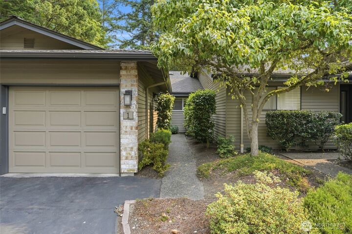 Property Photo: 15825 Village Green Drive 1 WA 98012