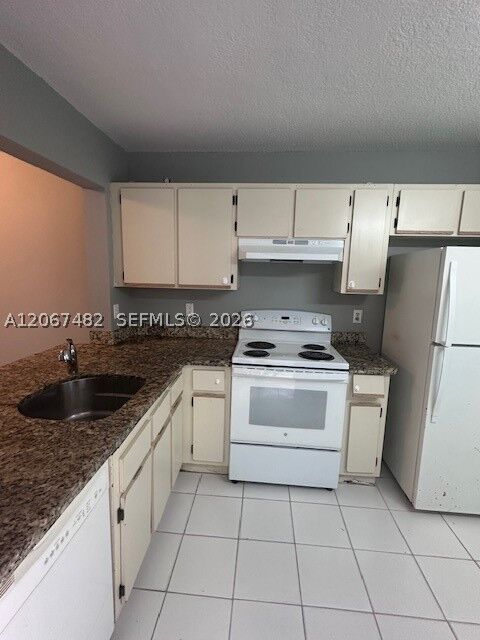 Property Photo: 20735 NE 8th Ct 101-12 FL 33179