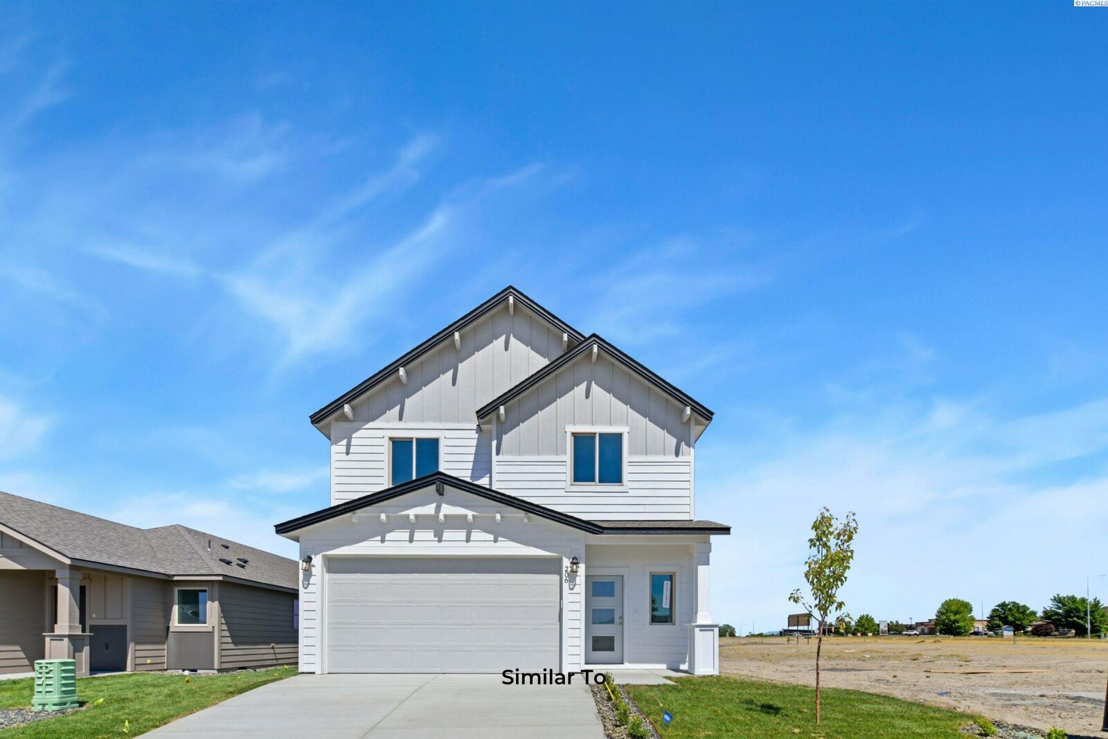 Property Photo:  710 Honeylicious St.  WA 99352 