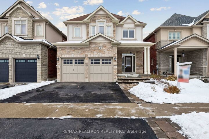 Property Photo: 12 Promenade Drive ON L1R 0L4