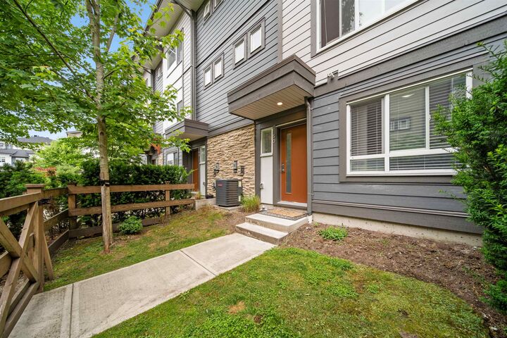 Property Photo: 8430 203A Street 50 BC V2Y 3N4