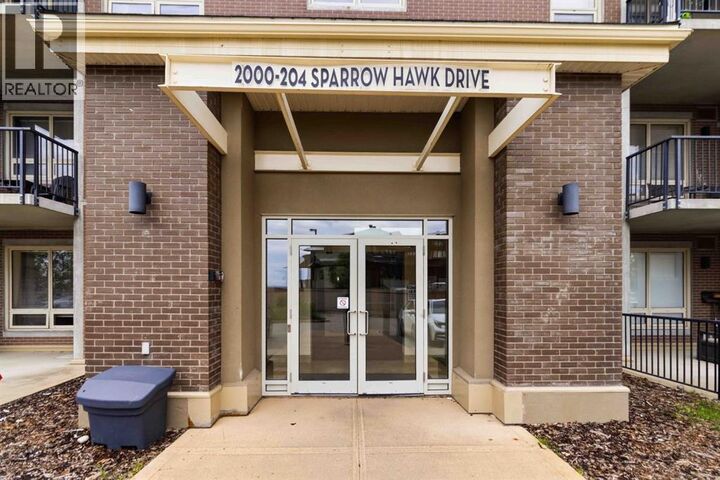 Property Photo:  204 Sparrow Hawk Drive  AB T9K 0P1 