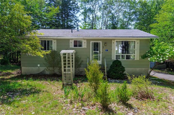 Property Photo: 1 Parkwood Drive NB E2E 1P4