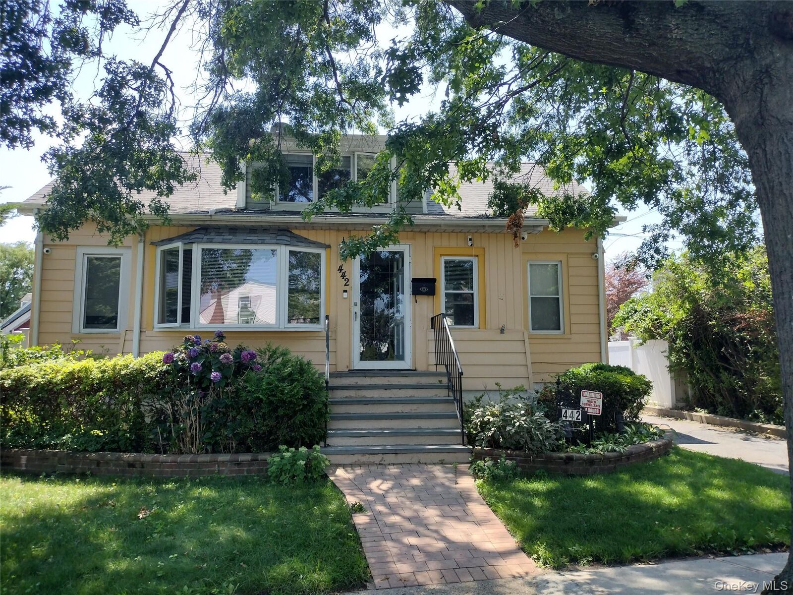 Property Photo: 442 Cedar Street NY 11553