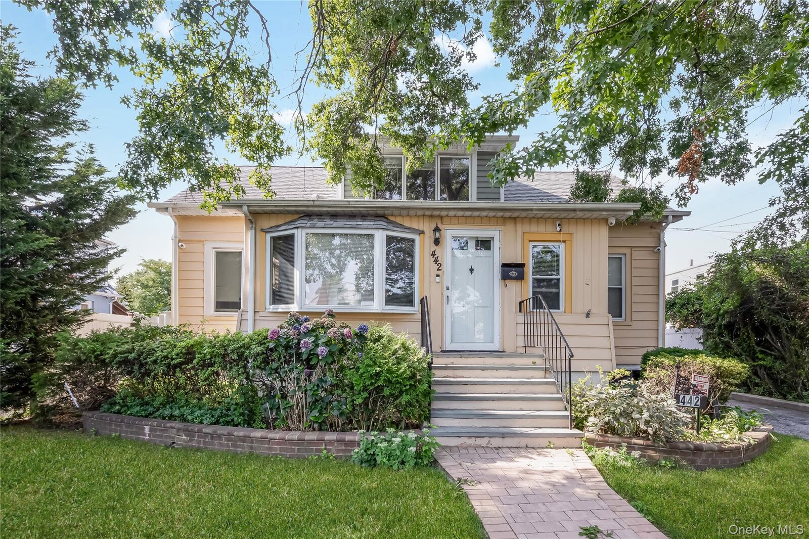 Property Photo: 442 Cedar Street NY 11553