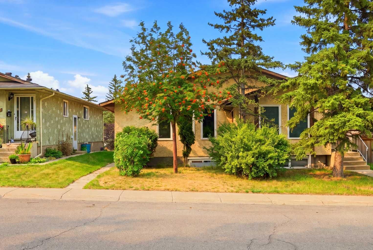 Property Photo: 228 Berwick Drive NW AB T3K 1P5