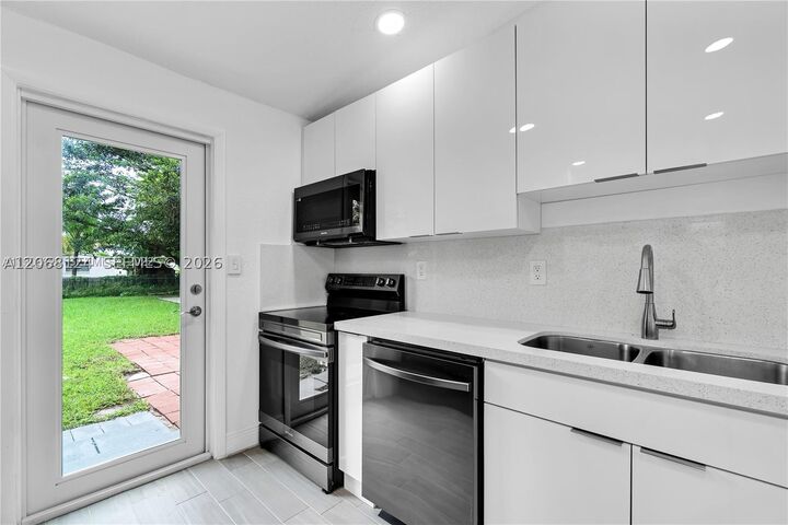 Property Photo: 1175 NW 133rd St FL 33168