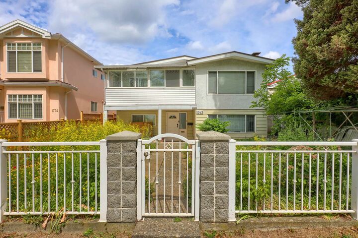 1743 E 49th Avenue — photo 1