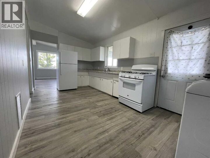 Property Photo:  5308 57 Street  AB T9V 2A3 