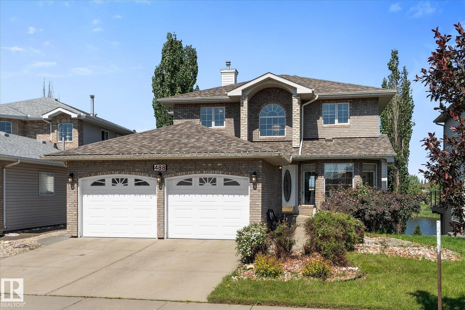 Property Photo: 488 Klarvatten Lake Wynd NW AB T5Z 3G7