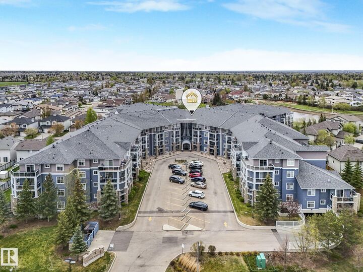 Property Photo: 16035 132 Street NW 208 AB T6V 0B4