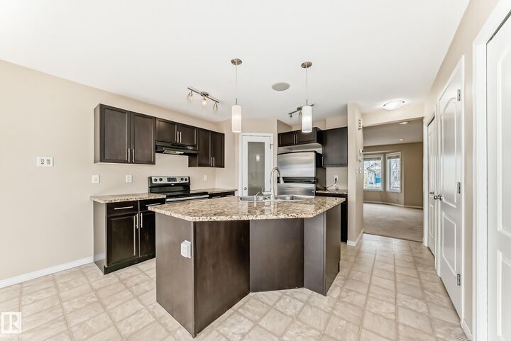 Property Photo: 7706 Schmid Crescent NW AB T6R 0K6