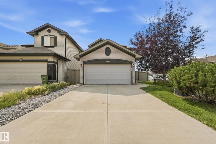 Property Photo:  11543 11 Avenue SW  AB T6W 1W8 