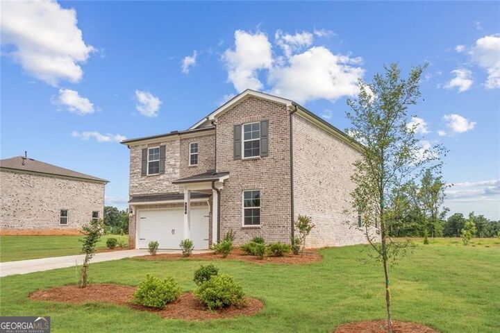 Property Photo:  317 Earnshaw Avenue Lot 110  GA 30253 