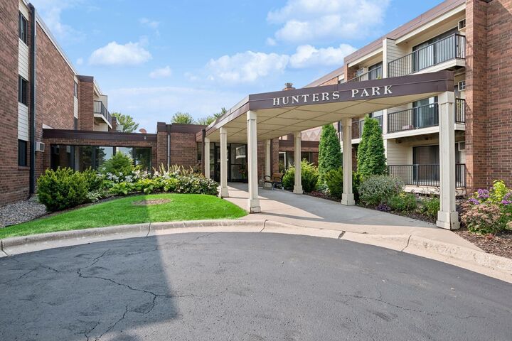 Property Photo: 4 Pine Tree Drive 215 MN 55112